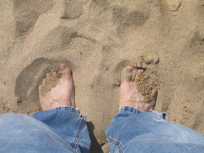 Les pieds dans le sable